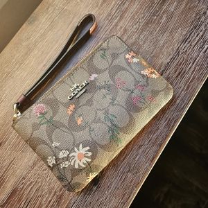 Coach Corner Zip Wristlet In Signature Canvas With Wildflower Print